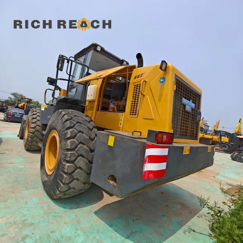 Side profile of a 2021 Longking 855 wheel loader showing the boom and bucket, $23,611